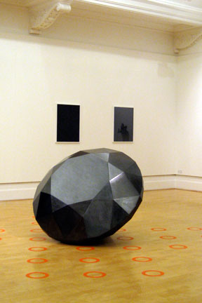 Art by Stuart Bastik in "Welcome to Paradise" exhibition at Art Gene. "The Weight of History is Crushing Me in my Bed" (foreground), with "Constellation" I and II (background).