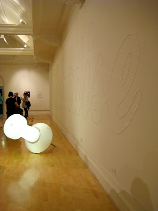 "The Giant Map Pin" (left) and "Paradise" (pushpins on wall) by The Ultimate Holding Company (with Art Gene)