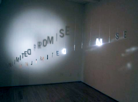In the project space: My installation, _Unlimited Promise_ (2009–2011, installation, foil-laminated paper, thread, light, shadow, dimensions variable).