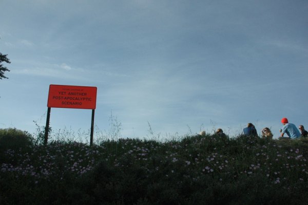 Usually you can find an art opening when hipsters are lounging out front. Here, they're accompanied by Discenza's sign.