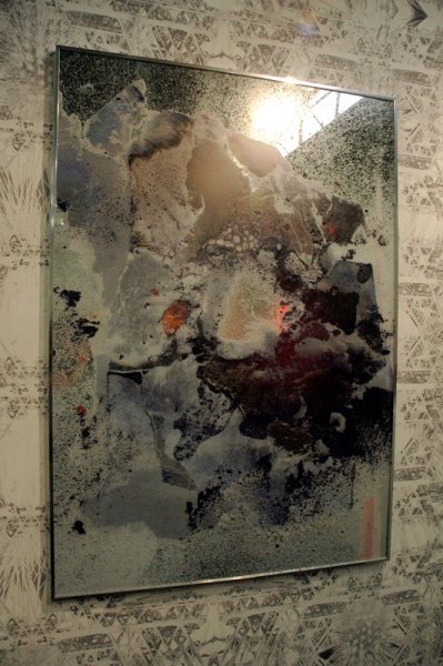 Mirrors with images, possibly direct-to-substrate printing; it's got that pebbly sheen. I couldn't figure out who this is. Rashad Newsome, maybe? Marlborough Gallery, Chelsea, NY.