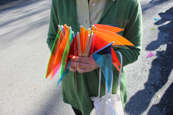 Lucas Artists Residency Program Director Kelly Sicat distributed mini vinyl flags for the public to use for voting.