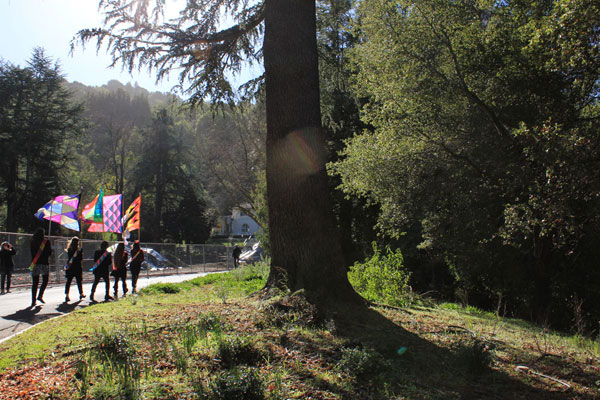 The ceremony ends in a procession back to the gallery, with attendees following.