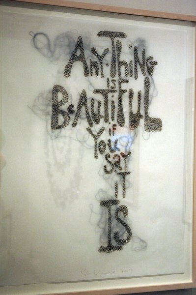 Rob Wynne's globby mirrored glass texts appeared in two different booths at the Armory, and both times they failed to charm me. Apparently limning decoration and tastelessness, he works with butterflies and flowers too. This trippy text style is a bit repellant to me, but I just wanted to note the bead and visible thread work on this vellum piece, if only because I've also been using "craft" materials as well, and thinking through how these materials work in art contexts.