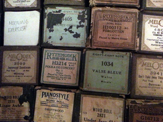 Boxes containing player-piano tunes.
