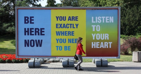 Susan O'Malley, Inspirational Posters: Be Here Now, You Are Exactly Where You Need to Be and Listen to Your Heart billboard, Rapackiego Square, Art Moves Festival, Toruń, Poland