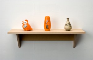 Haim Steinbach, Untitled (bird, nesting dolls, vase), 2006  MDF shelf; ceramic bird; wooden nesting dolls; Korean ceramic vase 11-3/4 x 33 x 10-1/2 in. (30 x 84 x 27 cm). // Source: HaimSteinbach.net.