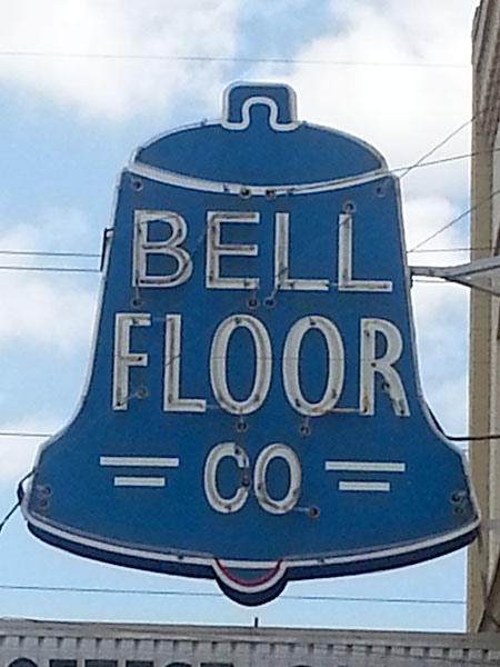 Neon sign in the Delano district. Bell Floor Co.