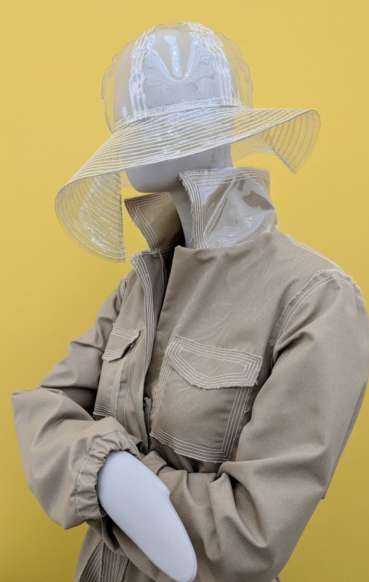 Rainwear garments made of recycled bottles, designed by Tracy Reese and sewed by a women's empowerment organization in Detroit. Mel Chin, “Flint Fit,” (2018-ongoing). // Photo: CWY.